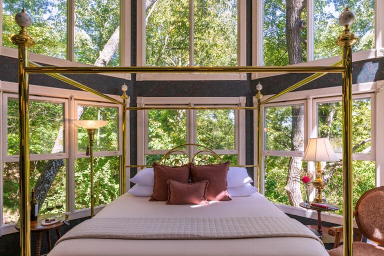 Bed and Breakfast in Eureka Springs, photo of a stunning four poster bed at Arsenic and old lace bed and breakfast